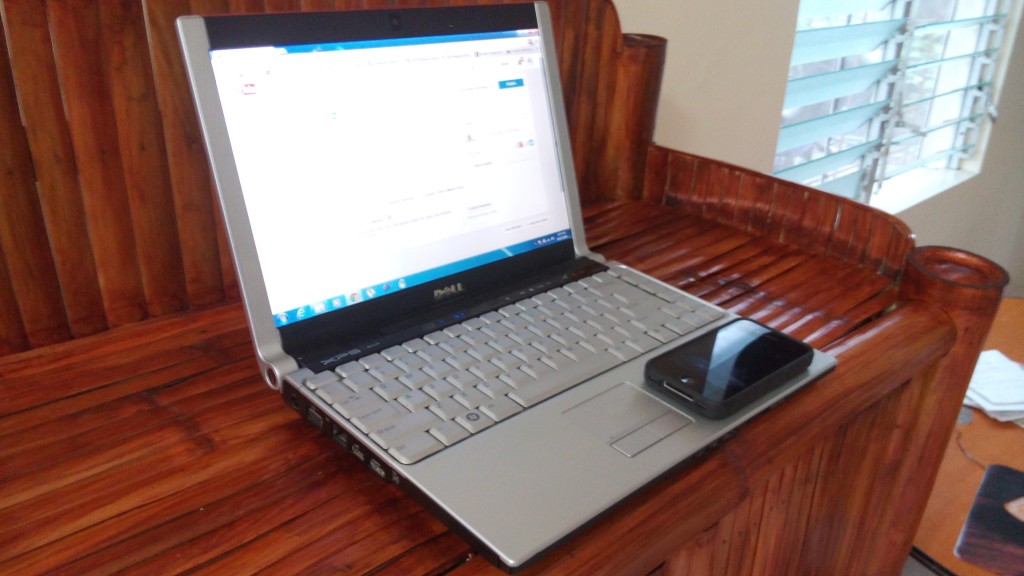 Our Dell XPS M1330 "backup" with iPhone 4S for scale.  Nice and portable!