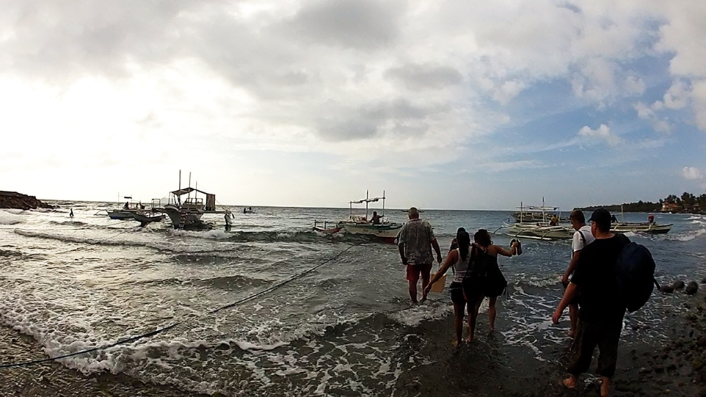 Apo walking out to pump boat