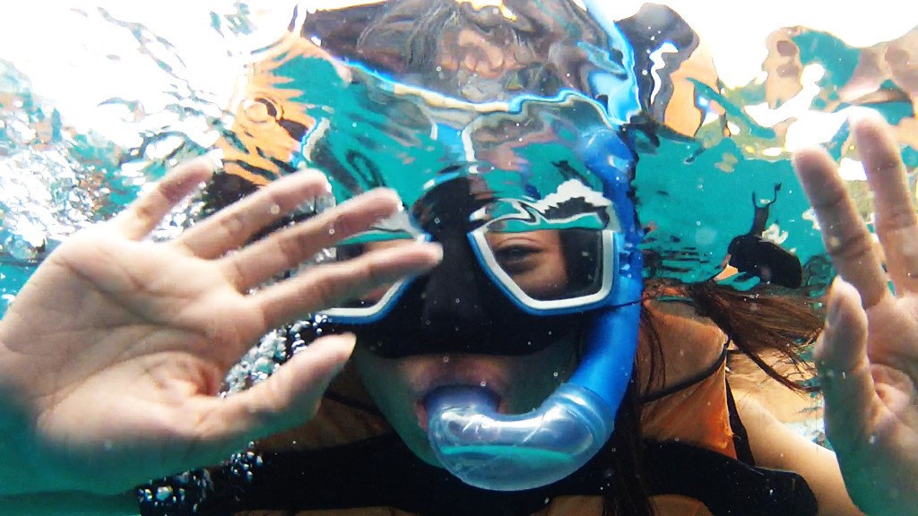 Michell Waving underwater